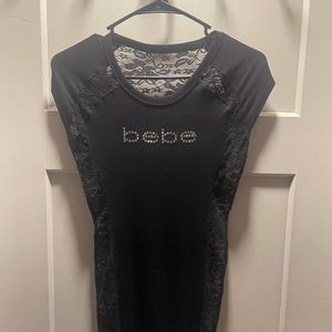 BeBe shirt. Lace down the side